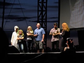 Grumpy Cat and Lil Bub "meet" onstage (click to enlarge)