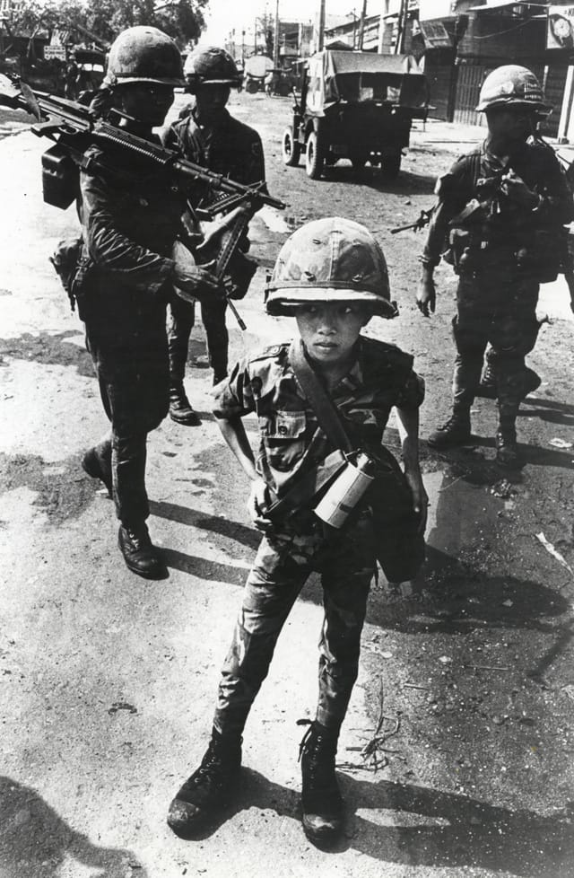 Philip Jones Griffiths, Welsh (1936–2008), Called “Little Tiger” for killing two “Viet Cong women cadre” — his mother and teacher, it was rumored, Vietnam, 1968, gelatin silver print, the Philip Jones Griffiths Foundation (courtesy of Howard Greenberg Gallery. © Philip Jones Griffiths / Magnum Photos.)