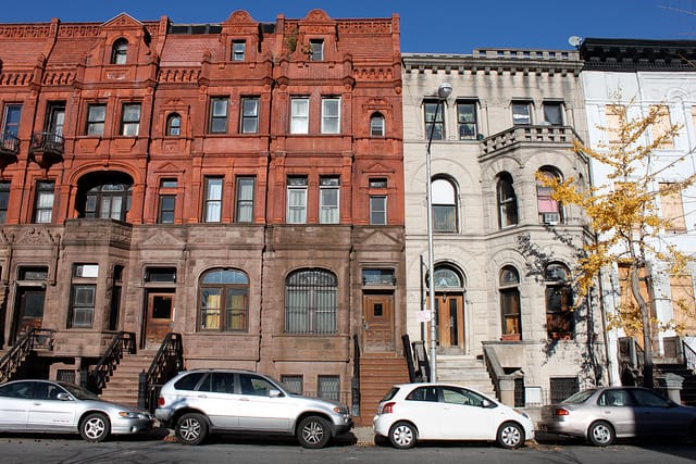 Cornices on Harlem row houses (photograph by joseph a/Flickr user)