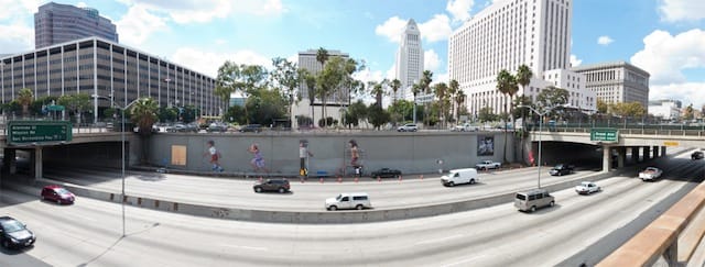 A restoration in progress of Glenn Avila's iconic Freeway Kids mural. Photo by Daniel Aguilar, via Notes on Looking.