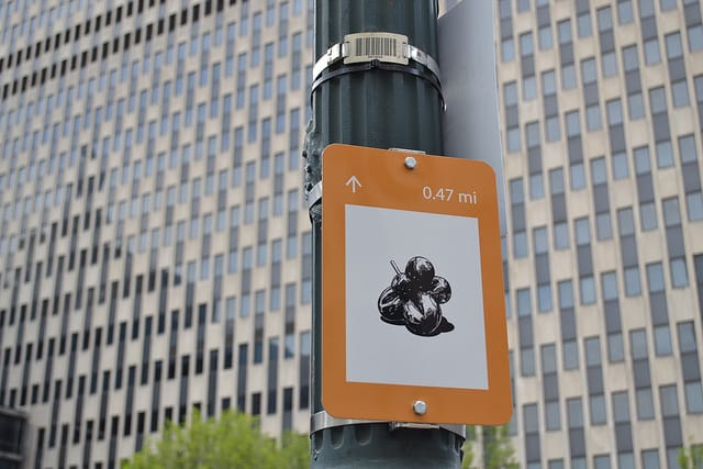 Sign for a Jeff Koons sculpture in Art within One Mile