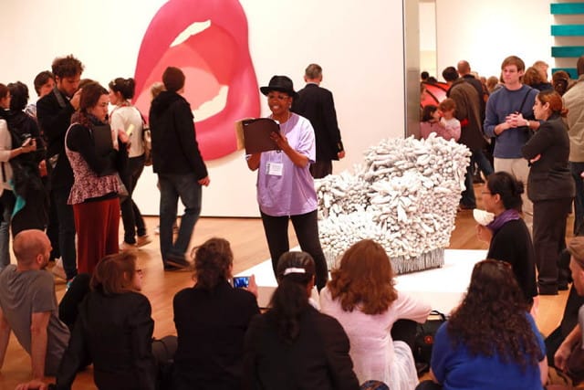 Simone White doing a guerrilla reading at the Museum of Modern Art (© Lawrence Schwartzwald (used with permission; no reproduction without express permission)