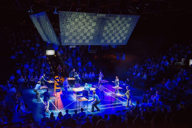 Photos of "The Machine" Written by Matt Charman and Directed by Josie Rourke about Gary Kasparov's 1997 chess match against IBM Big Blue, on September 5, 2013 during a performance with audience. the performers: Garry Kasparov -Hadley Fraser Clara Kasparov -Francesca Annis Feng-Hsiung Hsu- Kenneth Lee Mandy Dinkleman -Phil Nichol Murray Campbell- Trevor White Joel Benjamin -Brian Sills Mikhail Botvinnik/Dr. Hans Berliner/Owen Williams -John Ramm Photographer/Anatoly Karpov/IBM Vice-President 2/Cornelius Booth Tamsin/Karen Daley Myers Antonia Bernath Katya/Angela Burgess- Lucille Sharp IBM Vice-President 1/Ad Director David Mumeni Young Garry/Josh Lorenzo Allchurch/Nicholas Croucher AV Performer/Technician Daniel Harries Camera Operator/Performer Rob Lines Credit: Stephanie Berger. All Rights Reserved. Photo Credit: Stephanie Berger.