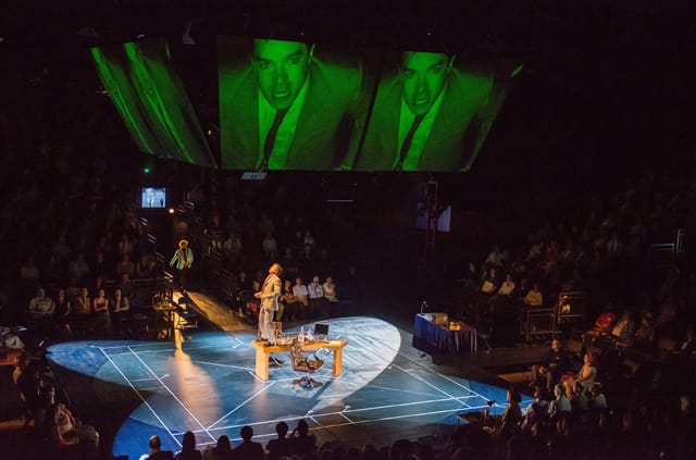 Photos of "The Machine" Written by Matt Charman and Directed by Josie Rourke about Gary Kasparov's 1997 chess match against IBM Big Blue, on September 5, 2013 during a performance with audience. the performers: Garry Kasparov -Hadley Fraser Clara Kasparov -Francesca Annis Feng-Hsiung Hsu- Kenneth Lee Mandy Dinkleman -Phil Nichol Murray Campbell- Trevor White Joel Benjamin -Brian Sills Mikhail Botvinnik/Dr. Hans Berliner/Owen Williams -John Ramm Photographer/Anatoly Karpov/IBM Vice-President 2/Cornelius Booth Tamsin/Karen Daley Myers Antonia Bernath Katya/Angela Burgess- Lucille Sharp IBM Vice-President 1/Ad Director David Mumeni Young Garry/Josh Lorenzo Allchurch/Nicholas Croucher AV Performer/Technician Daniel Harries Camera Operator/Performer Rob Lines Credit: Stephanie Berger. All Rights Reserved. Photo Credit: Stephanie Berger.