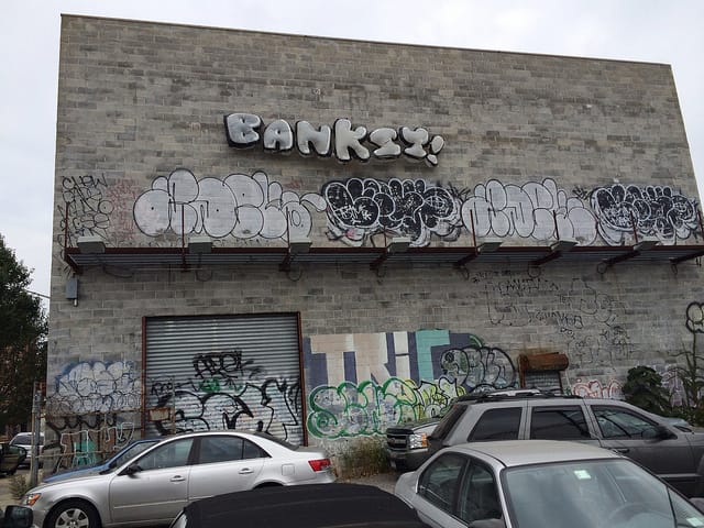 A view of the work from inside the parking lot, which was later closed to gawkers when someone stepped on car's roof and dented it.