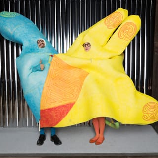 Lisa and Ted Landrum in their costume from last year's Critical Halloween. (via storefrontnews.org)