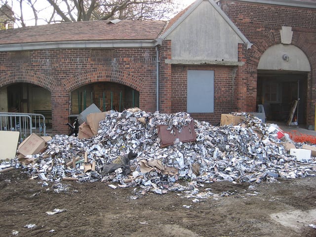 Brochures strewn around Ellis Island from the museum following Hurricane Sandy (via Sandy Response NPS)