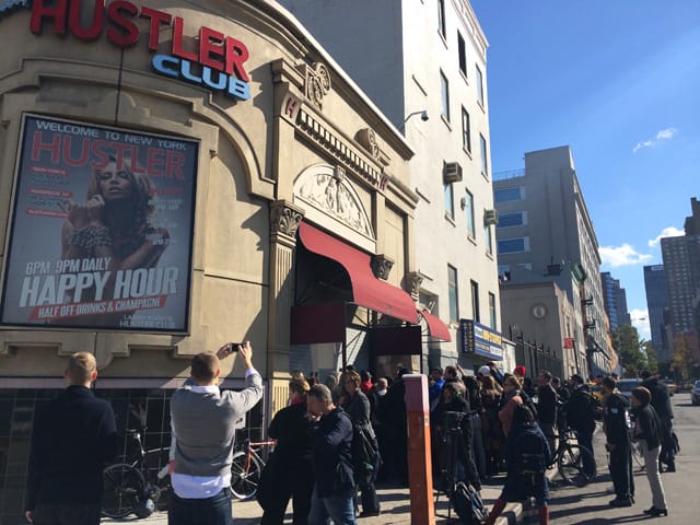 The Hustler Banksy with the crowds. (photo by the author for Hyperallergic)