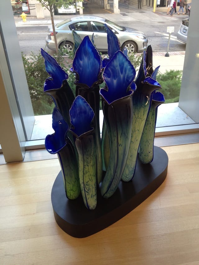 Jason Gamrath, blue flowers from "Botanical Exotica" at the Grand Rapids Art Museum.