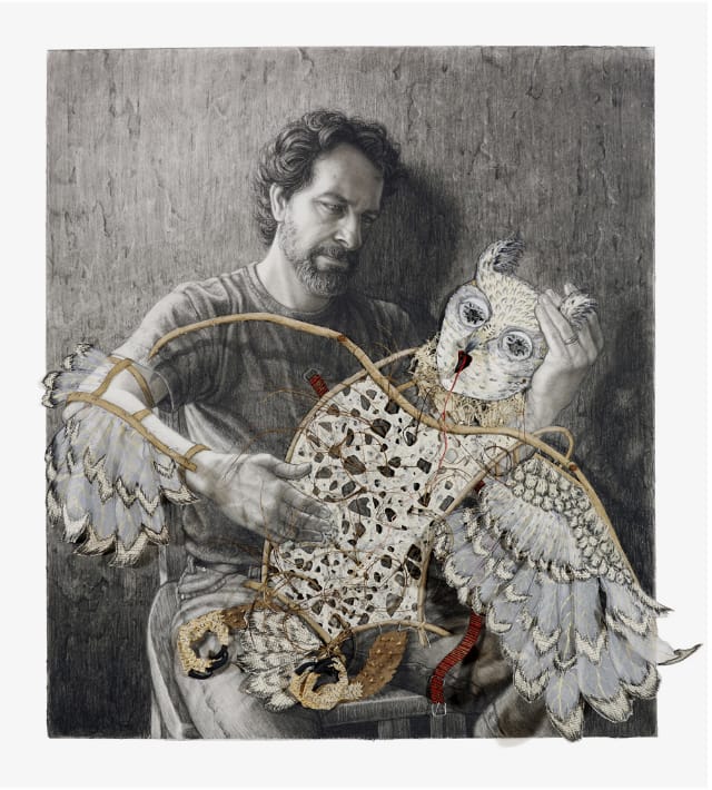 Riva Lehrer, "Mirror Shards: Tim / Owl" (2011), charcoal, glass, papers, Bible pages, wire, twigs, and collage on board "Chicago artist Tim Lowly is well known for work depicting his daughter, Temma, who is profoundly disabled. Temma had a stroke just after birth that caused her to become blind, paralyzed and non-verbal. Much of Tim's work has been an exploration of what it's like to be Temma. The owl costume on Tim's lap is an avatar for Temma. The Owl offers Tim a fragmented mask and fragile wings, in order to fully imerse himself in Temma's endless moment"