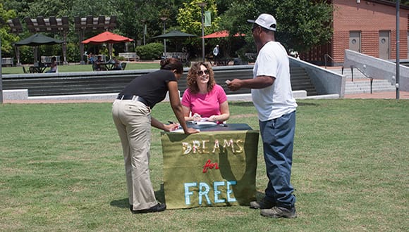 Jody Servon's "Dreams for Free" will happening at Art in Odd Places. (via number.artinoddplaces.org)