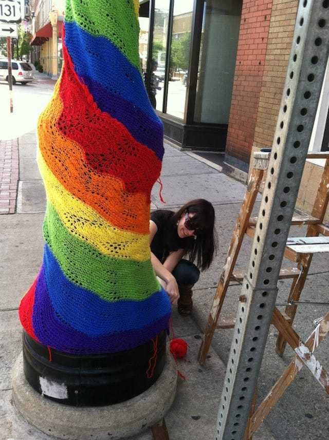 A rainbow-rific yarn bomb!