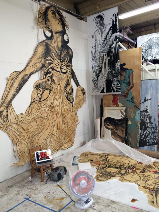 A corner of Swoon's studio.