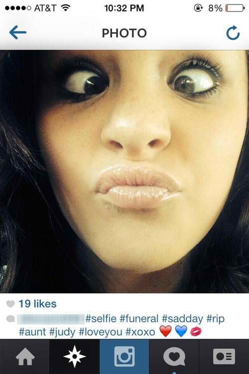 Yeah, this is a DUCK LIPS funeral selfie. (image via selfiesatfunerals.tumblr.com)
