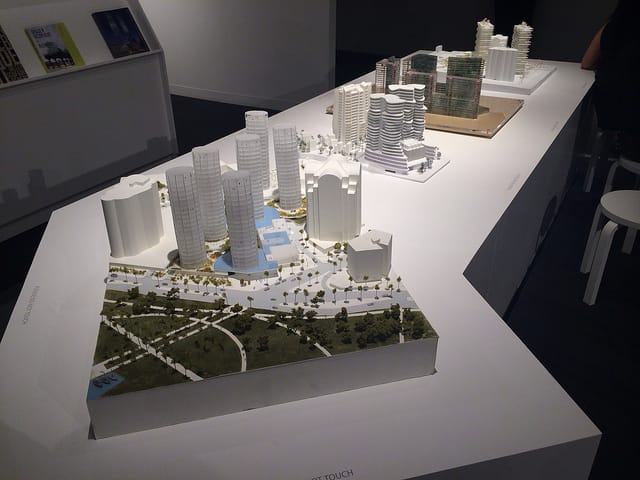 Maquettes for four proposed condo complex designs in Miami for the "Four (4): New Visions" exhibition at Design Miami. OMA's model in the foreground is the winning design.