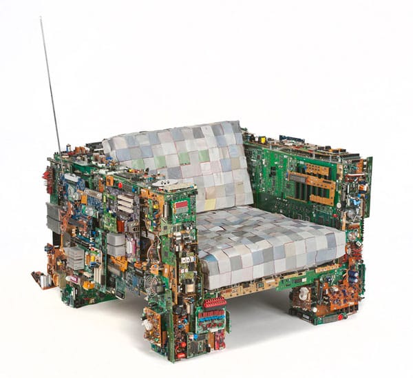 Benjamin Rollin Caldwell's "The Binary Chair" was one of the show stoppers at this year's Design Miami art fair. Made completely of computer parts (no underlying frame), including the cushions (though they are stuffed with foam), the work is an impressive work of contemporary design. (image via chairblog.eu)