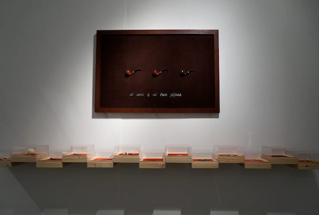 Surrealism loomed large at Context. A work by Daniel Gómez Naranjo that references Magritte hung at Galeria Enrique Guerrero, near the entrance to the fair. (all photos by the author for Hyperallergic)