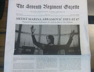 The program-cum-newspaper that announces Abramović's death (photo by the author for Hyperallergic) (click to enlarge)