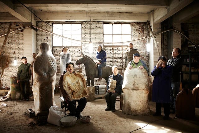 Prune Nourry and the craftsman team from the Li Yuan Terracotta Factory for Terracotta Daughters, Xi'an, China, November 2012, photograph by Zachary Bako 