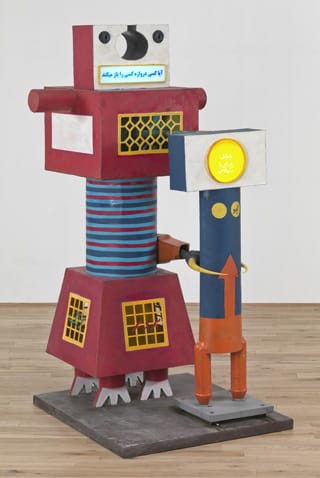 Parviz Tanavoli, "The Poet and the Beloved King (Lovers)" (1964), wood, tin plate, cooper, steel, flourescent light, plexiglass, and oil paint, 76 1/4 x 40 5/16 in. (194 x 102 x 110 cm), Tate: purchased using funds provided by Edward and Maryam Eisler, 2011 (photo courtesy Tate) (click to enlarge)