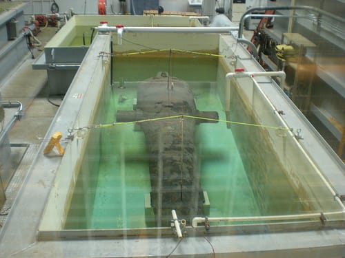 A cannon from the USS Monitor in a conservation tank at the Mariners' Museum (photography by Sarah Stierch, via Flickr)