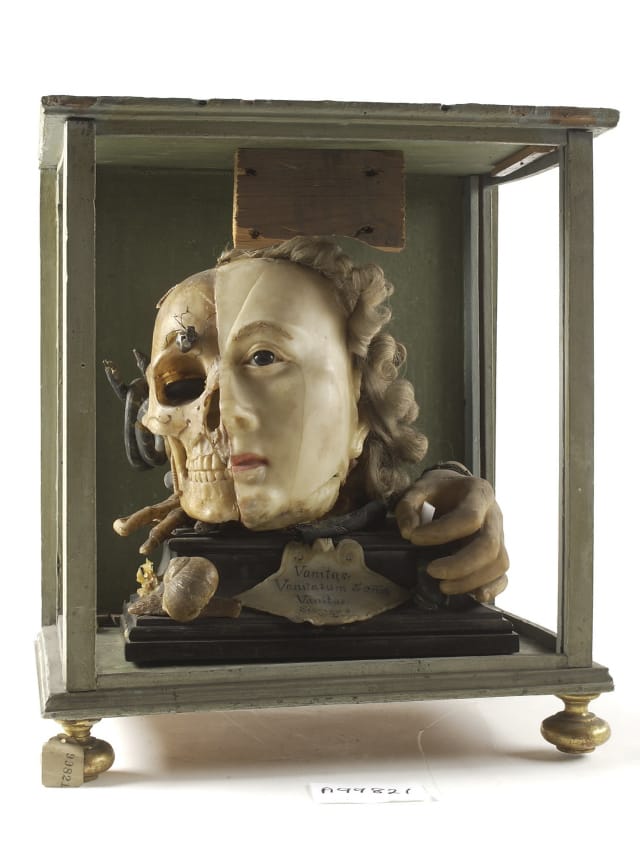 A Vanitas tableau in wax showing one side resembling Queen Elizabeth I, and the other a skull swarmed with insects and reptiles (18th century)
