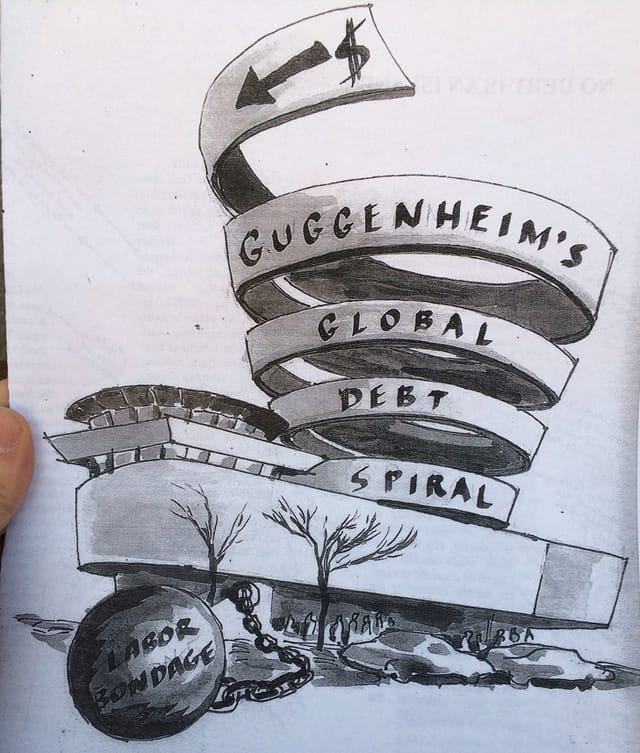 The front cover of an informational brochure distributed during a protest at the Guggenheim Museum, designed by Noah Fischer of Occupy Museums (photo by Mostafa Heddaya/Hyperallergic) (click to enlarge)