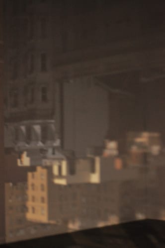 Zoe Leonard, "945 Madison Avenue" (2014), lens and darkened room