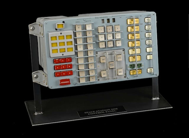 MIR SPACE STATION CONTROL PANEL.  A KEY PIECE OF HARDWARE FROM THE MIR SPACE STATION.  Control panel, aluminum and steel painted light blue, with plastic push buttons, glass light panels, digital display.  Provenance: Displayed at the 2000 World's Fair in Hannover, Germany as part of the Russian MIR Toru Control Centre exhibit.  Est. $4,000-6,000 