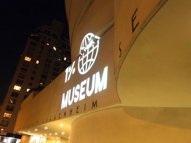 A view of the projection from the sidewalk in front of the museum.