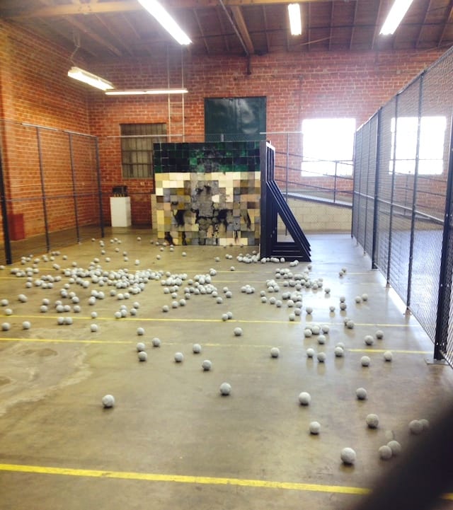 Detail of Andra Ursuta's "Stoned" as seen through the fence. 