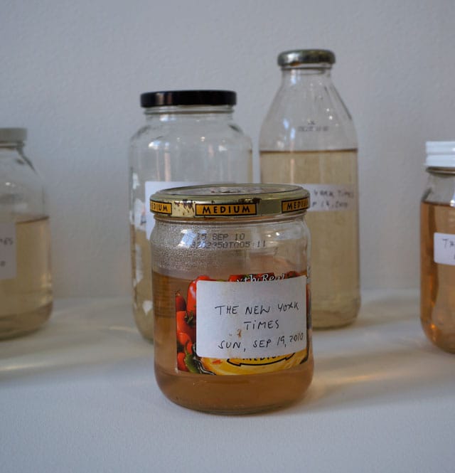 Kirsten Pieroth, "Conservation piece" (detail) (2010), 30 jars, liquids of boiled newspaper, at Galleria Franco Noero's booth
