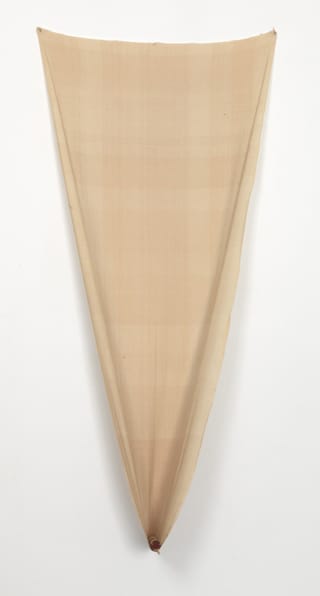 Robert Rauschenberg, "Vow (Jammer)" (1976), sewn fabric and rattan pole, 84 in x 40 in x 19.5 (Metropolitan Museum of Art, New York. Gift of Robert Rauschenberg Foundation, and Purchase, Lila Acheson Wallace Gift; Gifts of The A.L. Levine Family Foundation, Hon. and Mrs. Peter I. B. Lavan, and Sam A. Lewisohn, by exchange; Stephen Mazoh Gift, in honor of Nan Rosenthal; Arthur Lejwa Fund, in honor of Jean Arp; Marie Bannon McHenry, Anne K. Jones, and Barbara M. and Richard S. Lane Gifts; Gifts of Joan and Lester Avnet, Mr. and Mrs. Charles H. Blatt, and Mr. and Mrs. Harry E. Gould, by exchange; Norman M. Leff Bequest; and Gifts of the Committee for Dolia Lorian and Mrs. Francis Kughler, by exchange, 2013)