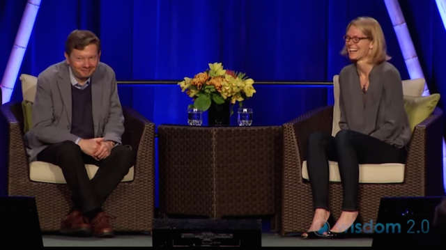 Echkart Tolle and Karen May at Wisdom 2.0. Image via YouTube.
