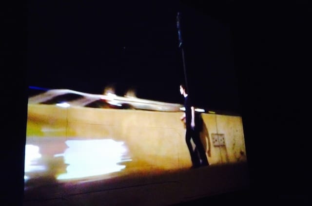 Still from Klara Lidén, "The Myth of Progress (Moonwalk)," 2008. Photograph by the author for Hyperallergic.