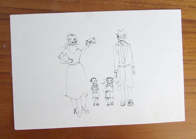 A postcard from Jennie Ottinger's "Postal Mortem." The caption on the back reads: "We pay our bills the old fashioned way. We mail them." (click to enlarge)