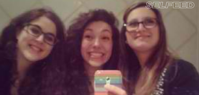 Random screengrab of Selfeed.com, the live feed of all #selfies on Instagram.