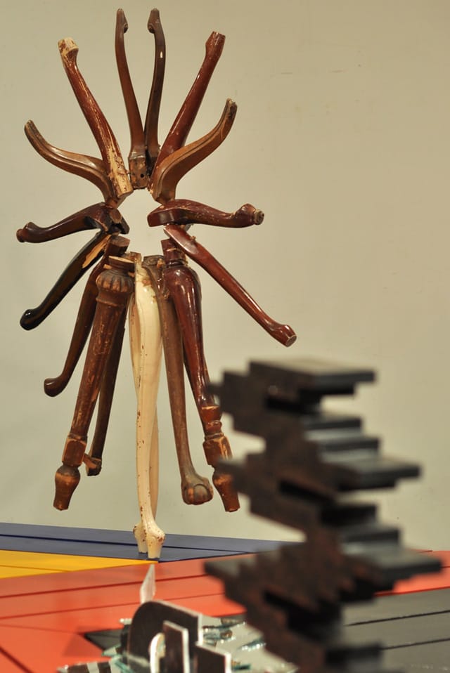 Marc Andre Robinson's "Not yet titled" (2014) with radiating table lets with Rico Gatson's "Myster Object #5" (2014) in the foreground and Lars Kremer's "HIDE (broken mirror transient reflective)" (2014) in between. (all photos by the author for Hyperallergic)