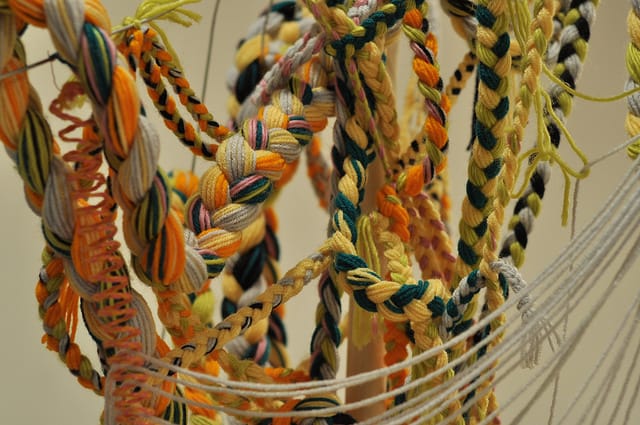 Detail of Ellie Murphy's "Untitled (Post)" (2014), acrylic yarn, wood, metal, palsticine, and plastic.