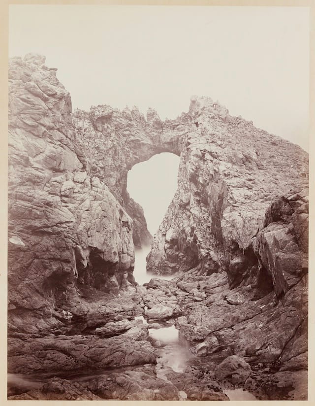 Carleton Watkins (U.S.A., 1829–1916), Arch at the West End, Farallones, 1868–1869, from the album Photographs of the Pacific Coast. Albumen print. Lent by Department of Special Collections, Stanford University Libraries.