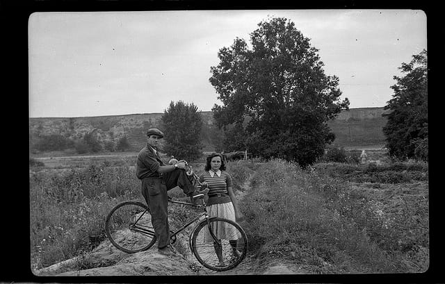 A cycling couple (via Costică Acsinte Archive)