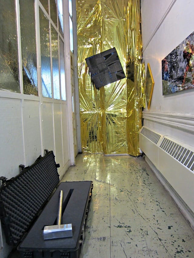 Art by Ahmet Civelek (the hammer) and Vargas-Suarez (on the back wall), presented by Universal, IFAC & Wallplay