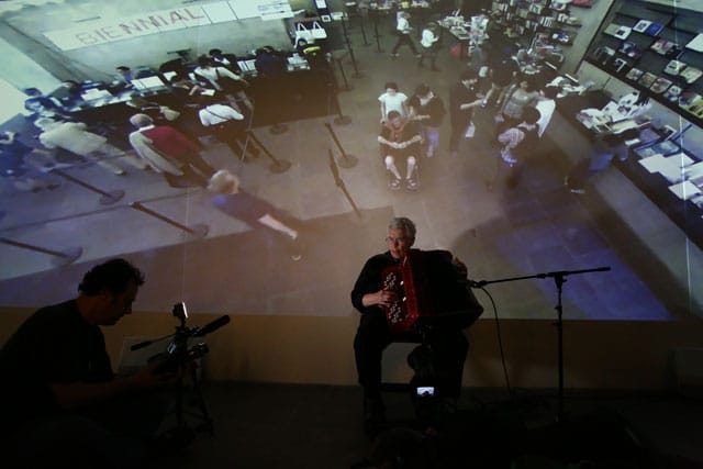 Pauline Oliveros performing in "Deep Listening Room" (2014) at the 2014 Whitney Biennial, May 25, 2014, Whitney Museum of American Art, New York (photo © Paula Court)