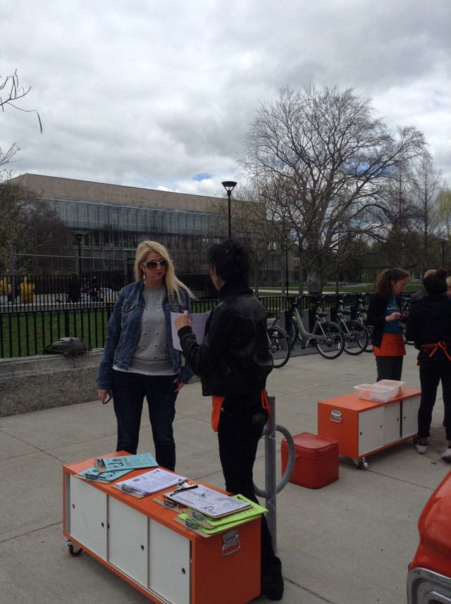 NannyVan workers giving out information in front of the Cambridge Library (click to enlarge)