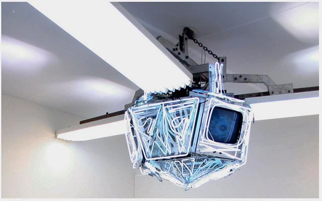 Nam June Paik, Diamond Sat, 1998, 3 TVs, 1 channel, neon bulbs, courtesy Galerie Hans Mayer