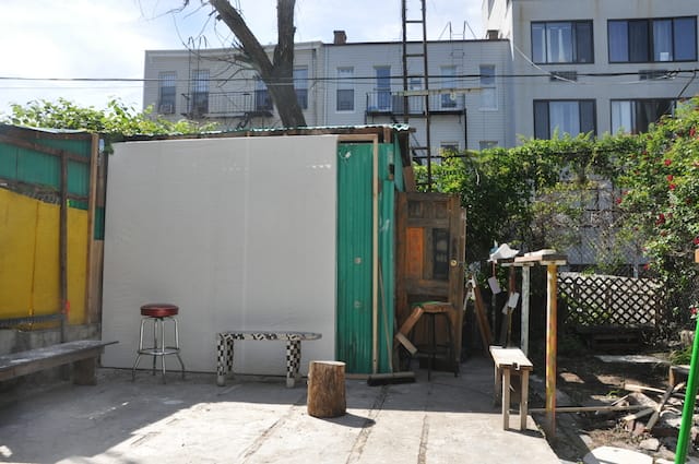 The backyard featuring "Tarp Dream" (2014)