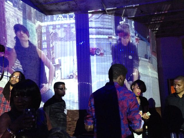The bar at Freecandy, with Maureen Catbagan's video projected above