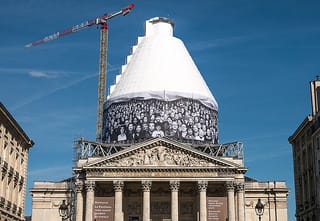JR's installation on the Pantheon in Paris (photograph by Yann Caradec, via Flickr)