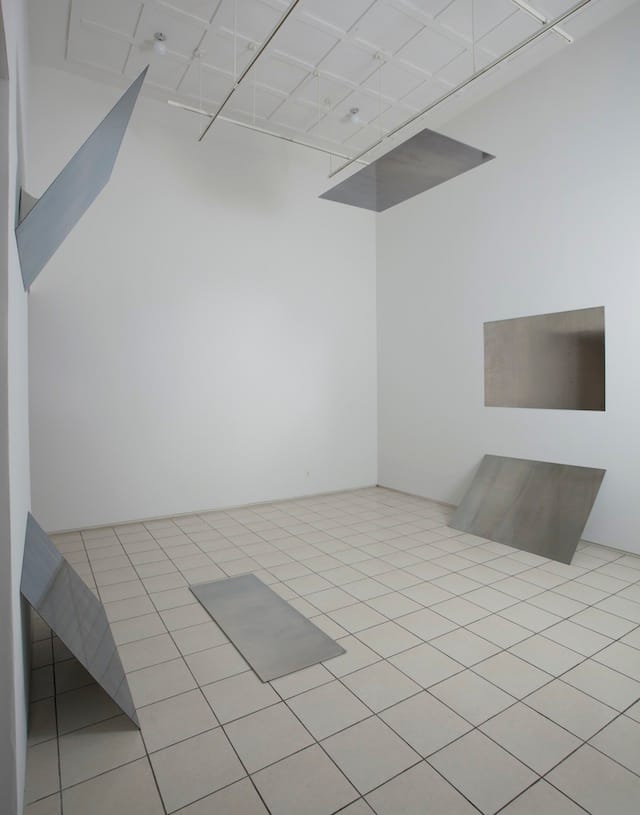 Liz Deschenes, American, born 1966 T_i_l_t_/_S_w_i_n_g_ _(_3_6_0_º _f_i_e_l_d_ _o_f_ _v_i_s_i_o_n_,_ _v_e_r_s_i_o_n_ _1_)_, 2009 Black and white photograms mounted on metal Overall 136 x 192 x 58" (345.4 x 487.7 x 147.3 cm), original installation room dimensions 206 x 192 x 216" (523.2 x 487.7 x 548.6 cm)