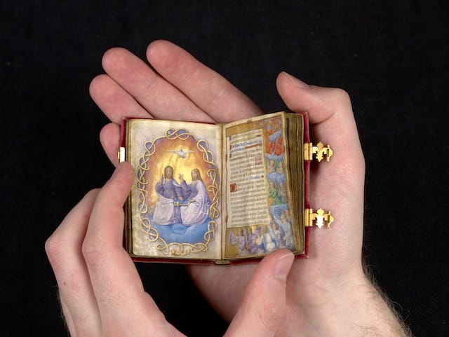 Trinity and Adoring Choirs of Angels Illuminated by the Master of Claude de France Prayer Book of Queen Claude de France; France, Tours, ca. 1517 The Morgan Library & Museum; MS M.1166 (fols. 24r-25) Gift of Mrs. Alexandre P. Rosenberg, in memory of her husband Alexandre Paul Rosenberg. Photography by Schecter Lee.